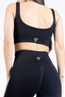 Dettaglio del tessuto e della cucitura dei leggings push-up neri