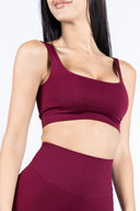 Top sportivo Burgundy, elasticizzato, adatto per allenamento e tempo libero.